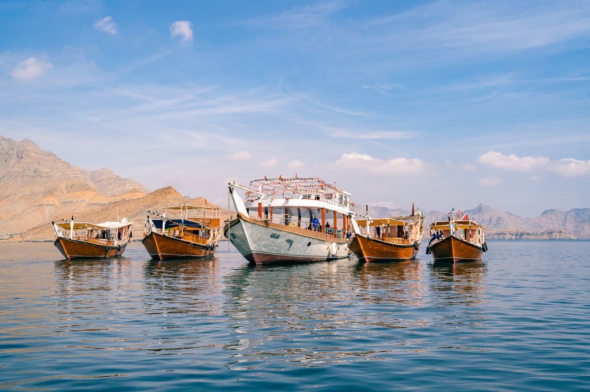 Authentic Omani wooden dhow cruising with wild dolphins in Khor Sham Musandam